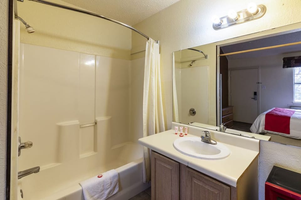 Refresh with a hot shower and bright, spacious vanity.