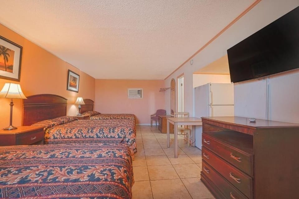 Enjoy easy snacks with in-room fridge and simple dining spot.