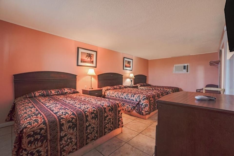 Recharge in warm lighting with comfortable beds for everyone.