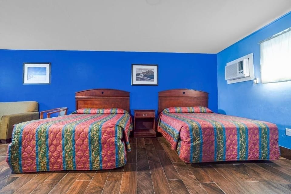Unwind on colorful quilts after a full day exploring.