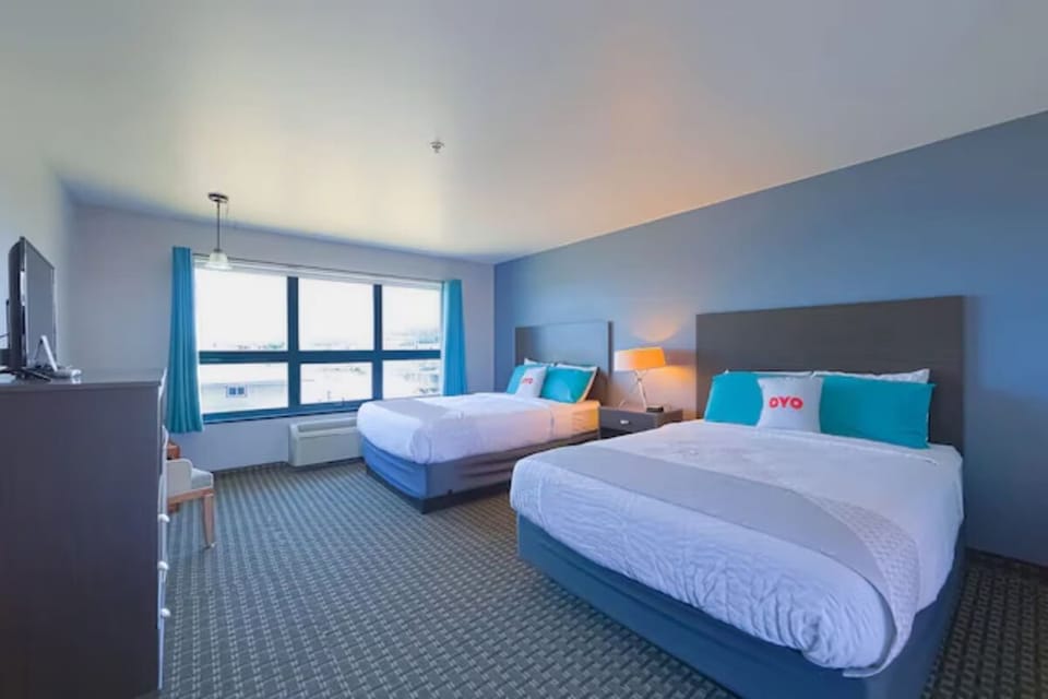 Settle in with spacious comfort, soft linens, and warm lighting.