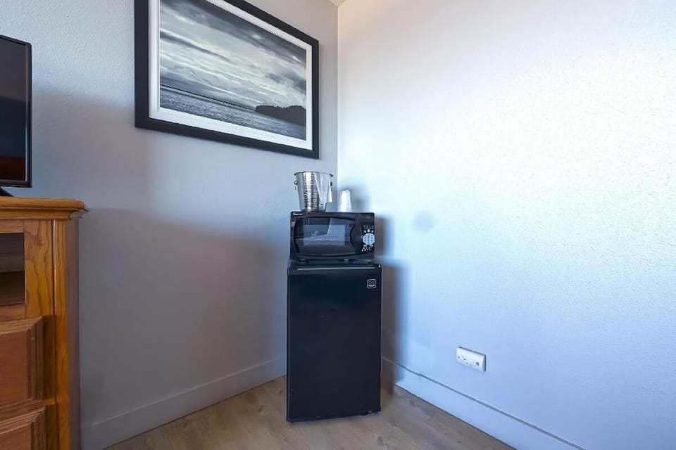 Grab quick snacks anytime with microwave and mini-fridge.
