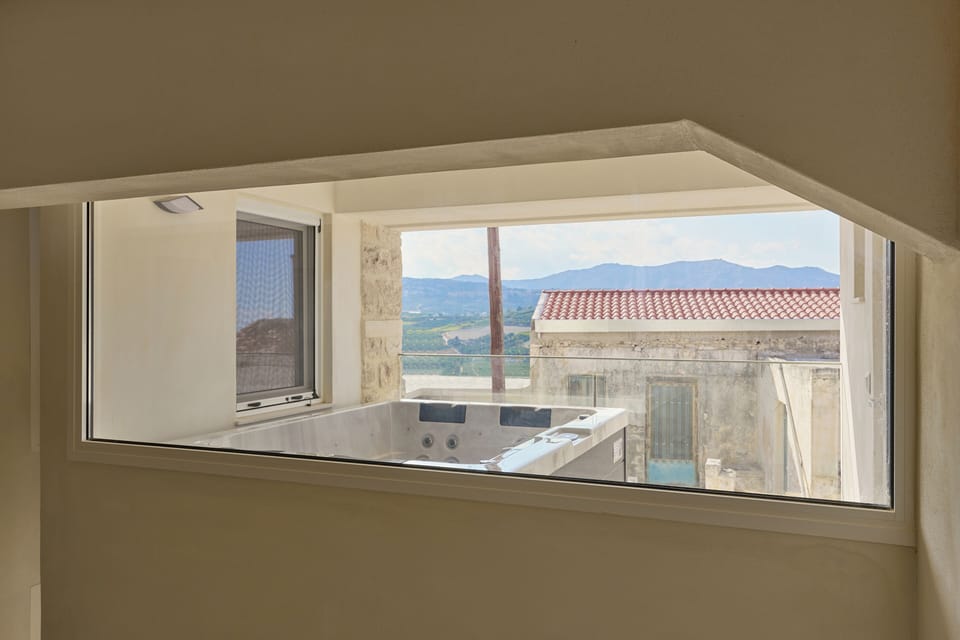 view for the upstairs foyer with the double sofa bed