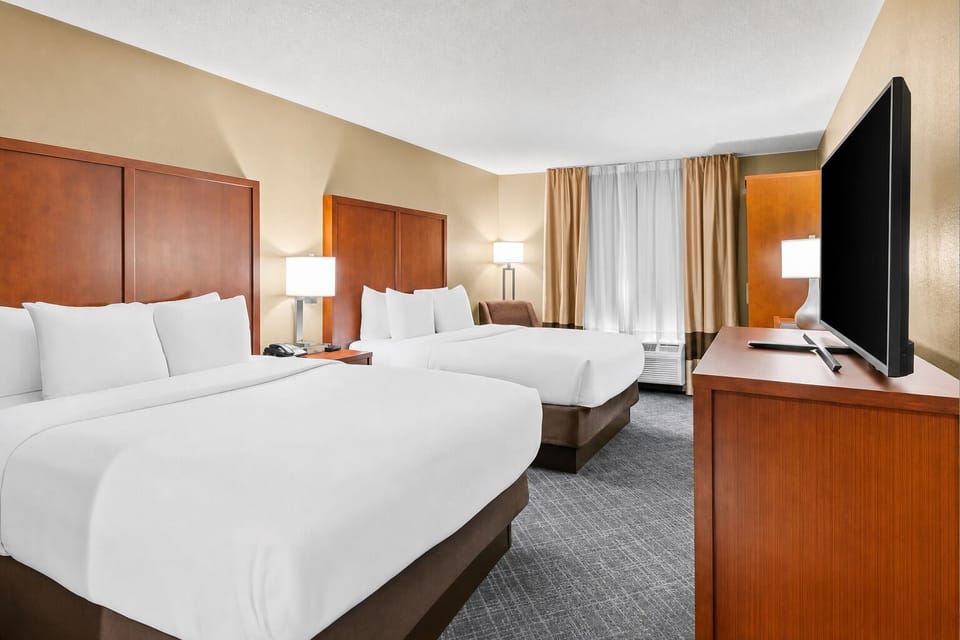 Stretch out with two plush beds and a bright window view.