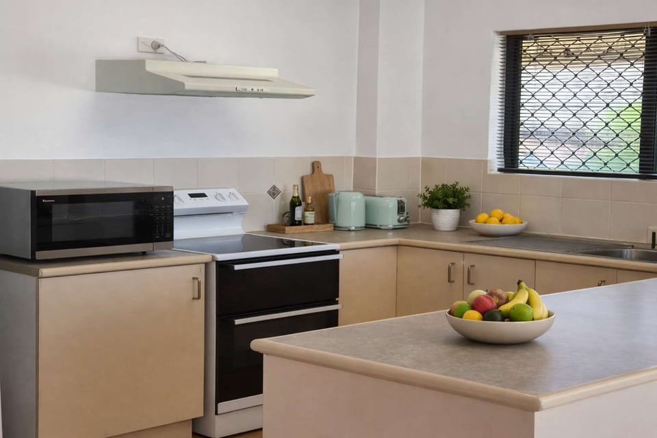 Fully equipped kitchen with modern appliances