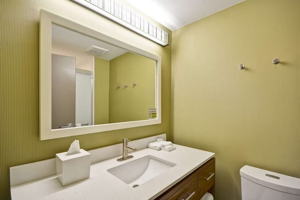 Start your day at a bright vanity with ample counter space.