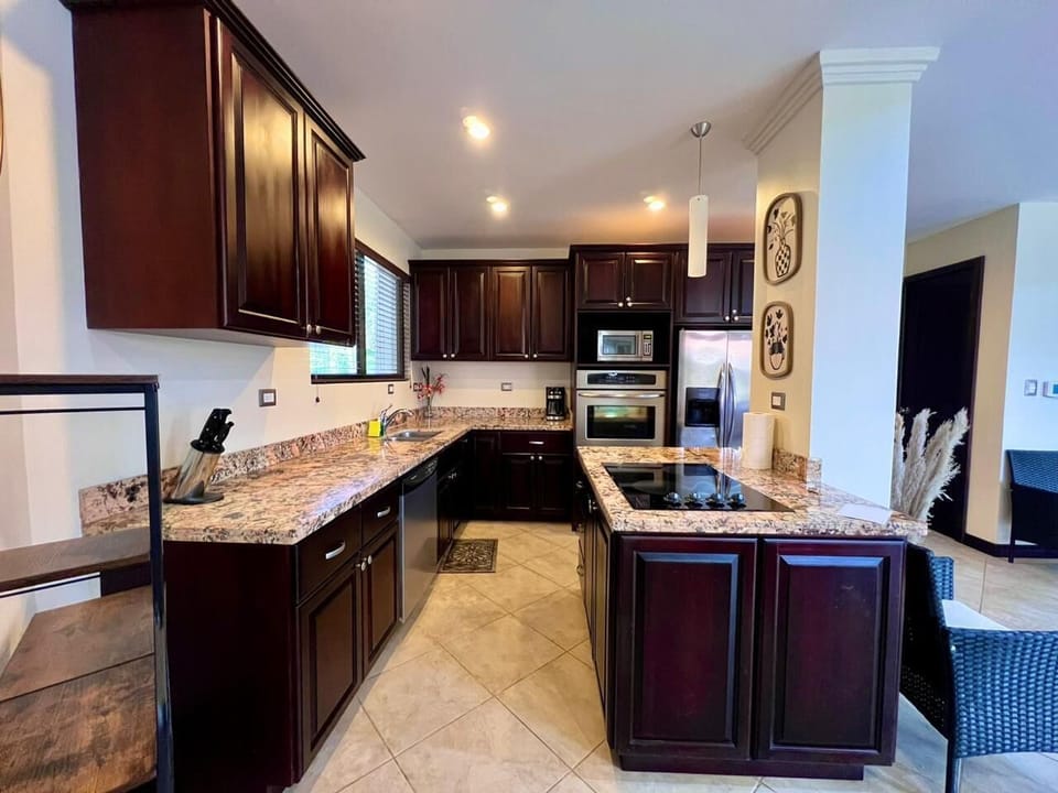 Fully equipped kitchen with granite countertops