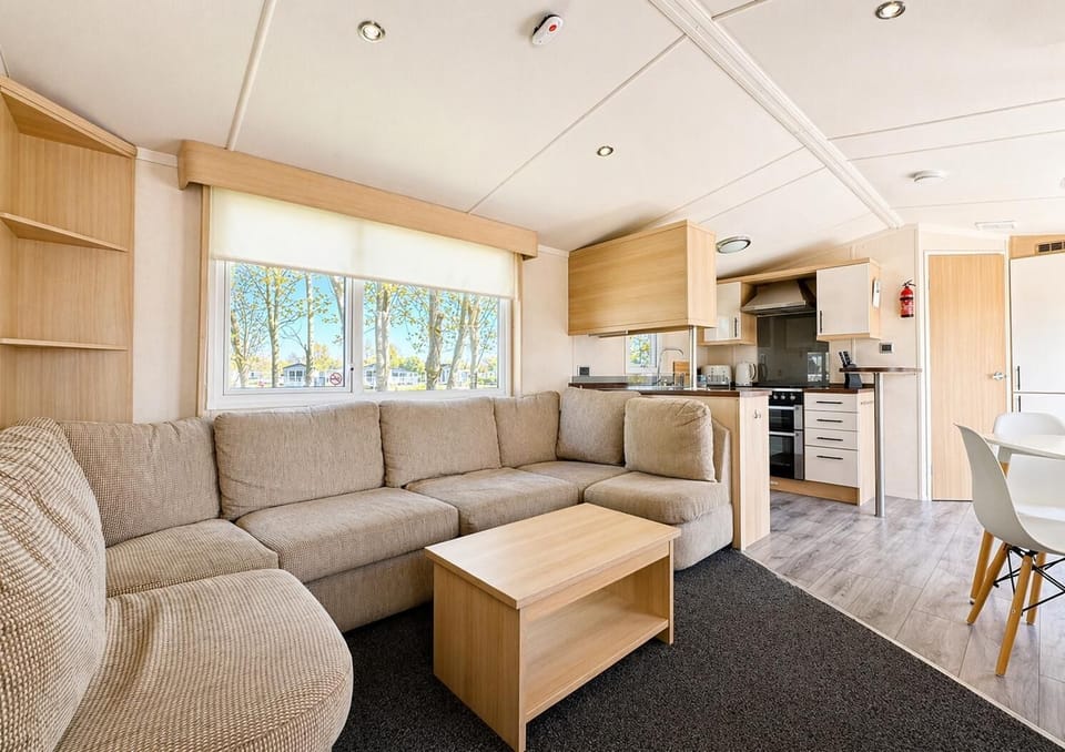 The large sofa in this Yorkshire caravan is the perfect place for the whole family to enjoy catching up on their favourite TV shows. Grab some snacks and treats before catching up.