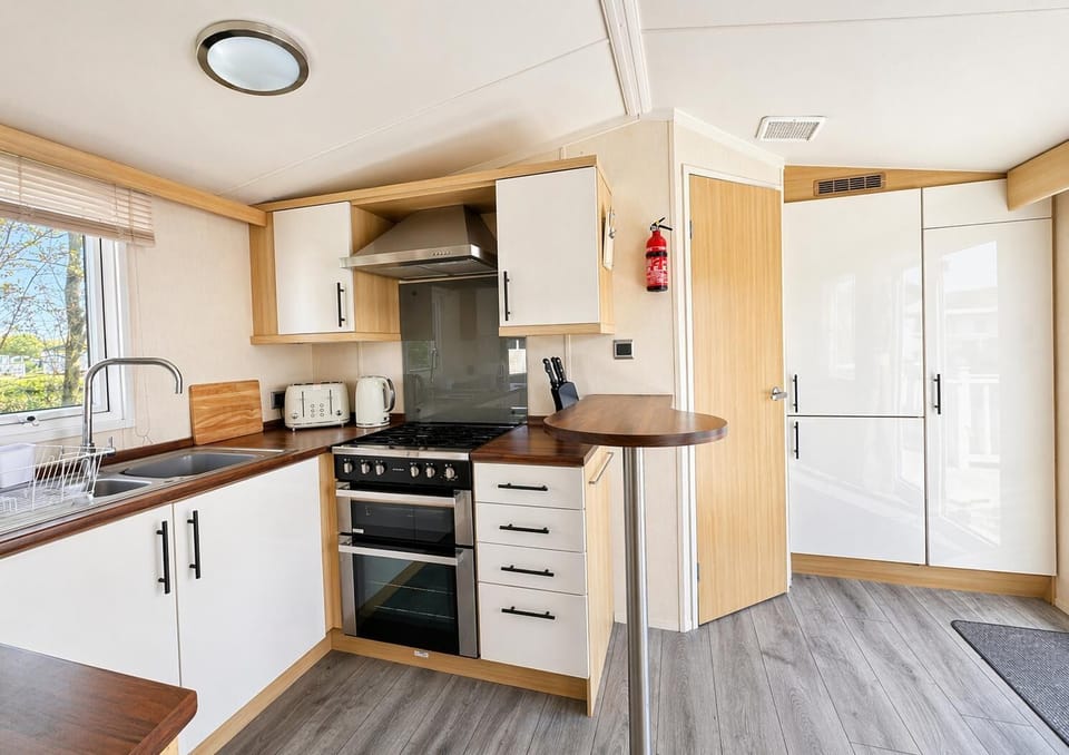 The kitchen has all the basic cooking and dining equipment you will need to cook the family favourties. Start the day here with a fresh cup of coffee before watching the world wake around you.