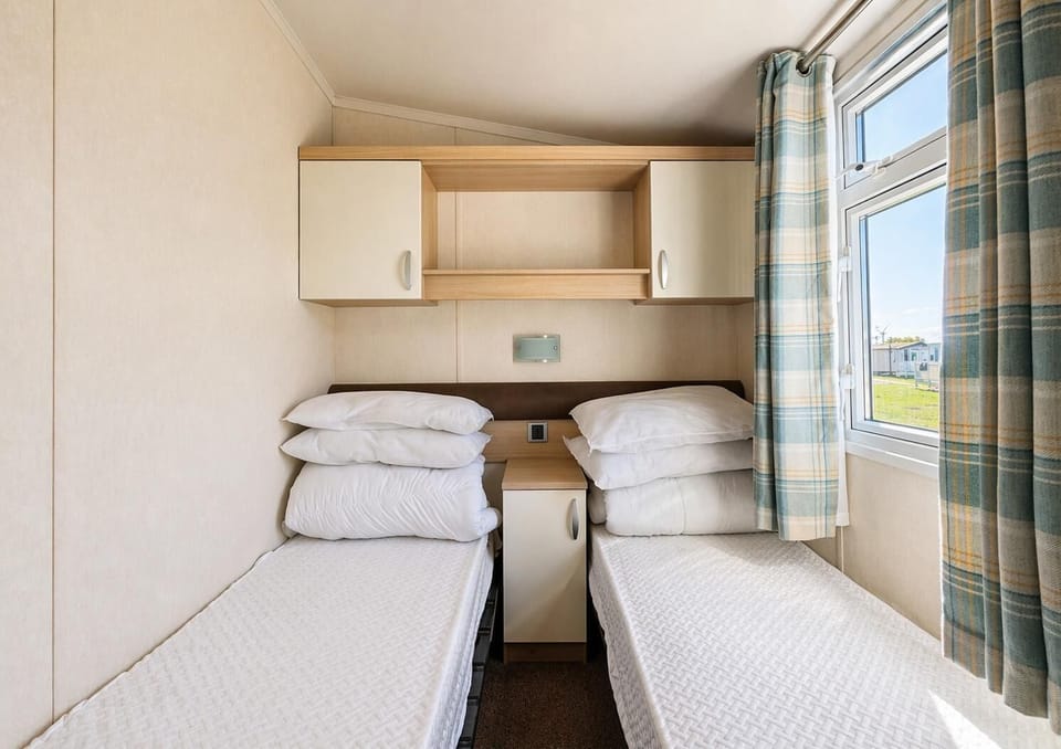 The second twin room is perfect for travelling with extended family. They will appreciate having their own space to retreat to after a busy day.