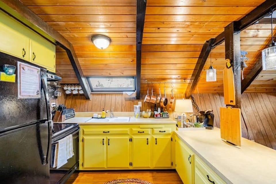The kitchen also has a tree-top view.