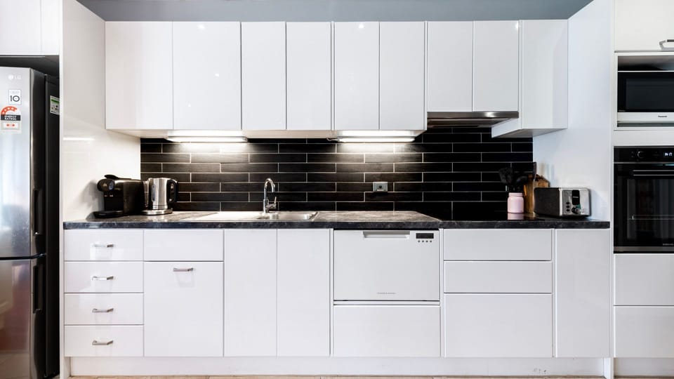 A well-designed kitchen with modern appliances to create your favorite meals.