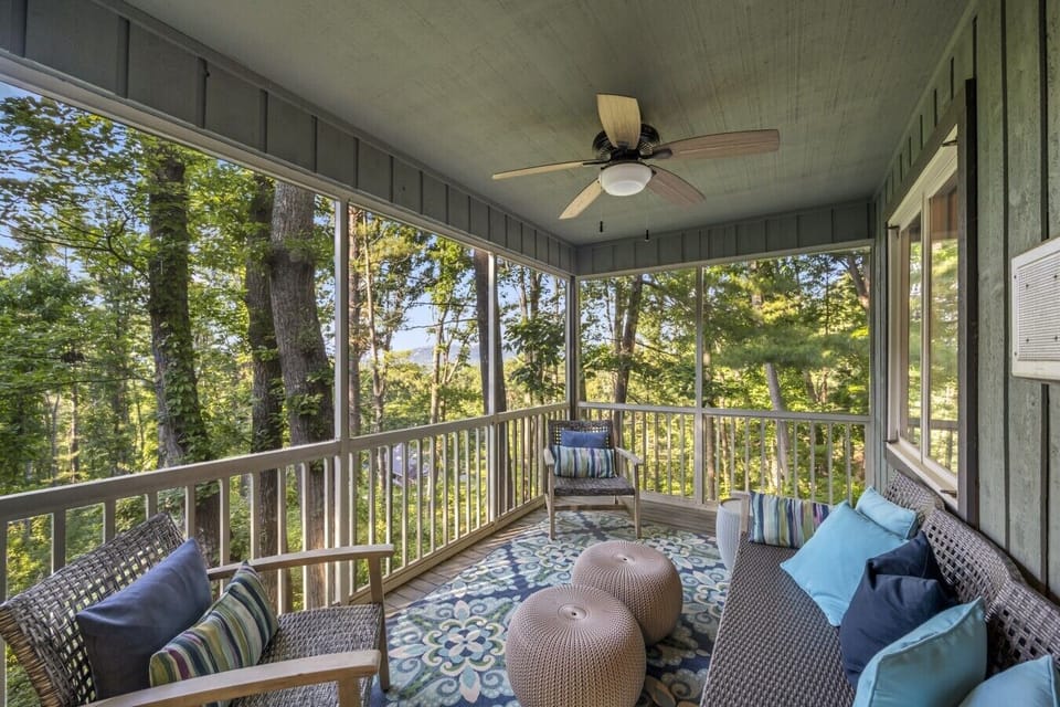 Screened porch for slow mornings in the trees