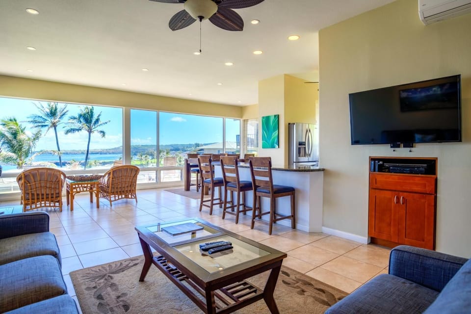 Stylish and serene, this living area invites you to unwind after a beach day with its cozy couch and open layout     KBV-16G4