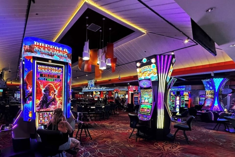 Explore vibrant gaming floors glowing with neon, late-night buzz.
