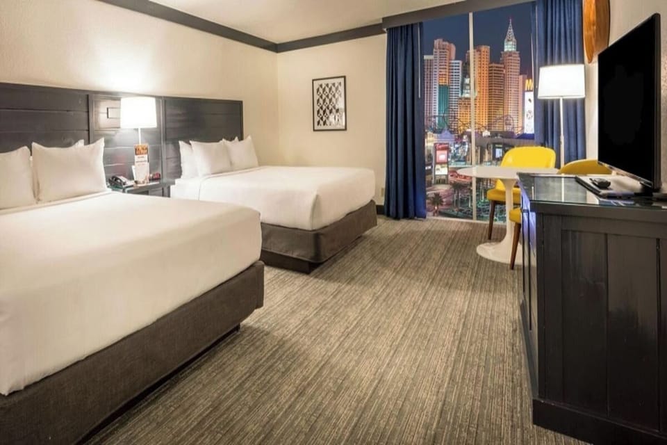 Stretch out with two plush beds and cozy seating nook.
