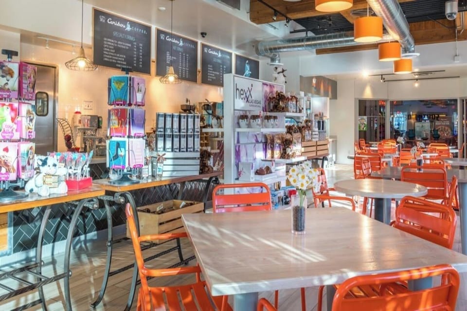 Settle in with pastries and sunshine at cozy tables.