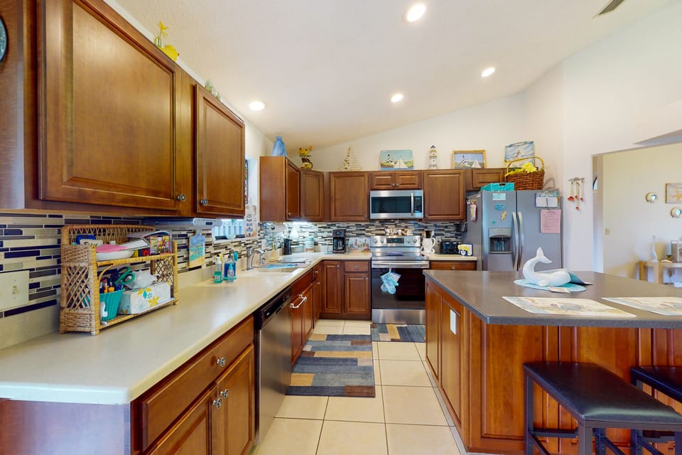 Large kitchen with plenty of counter space and kitchen island