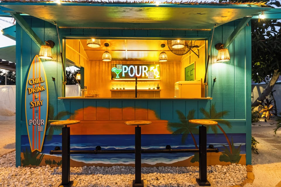 Welcome to POUR Bar — where chill meets thrill! 