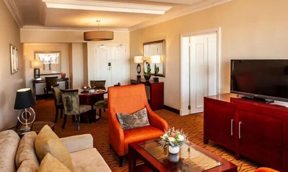 Lounge comfortably by the window with soft, calming light.