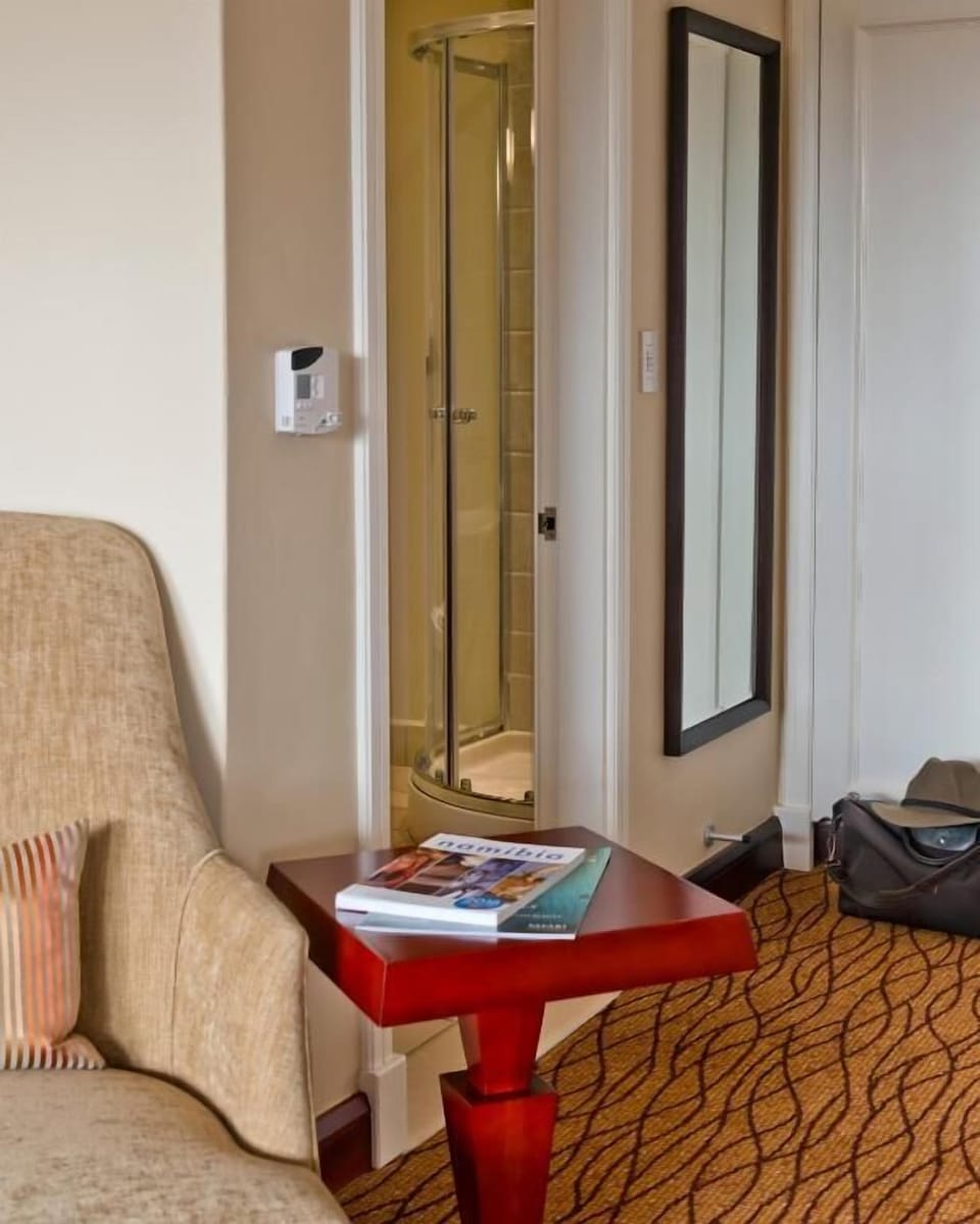 Step into comfort with inviting seating and thoughtful in-room touches.