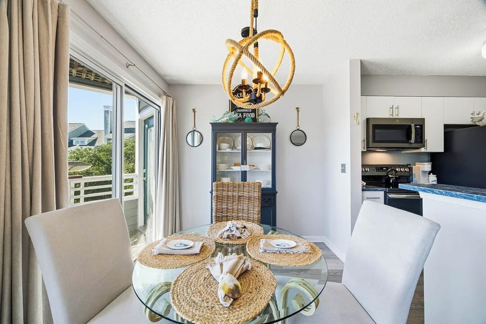 Main-Level Dining Room with Table (seats 2) and Deck Access