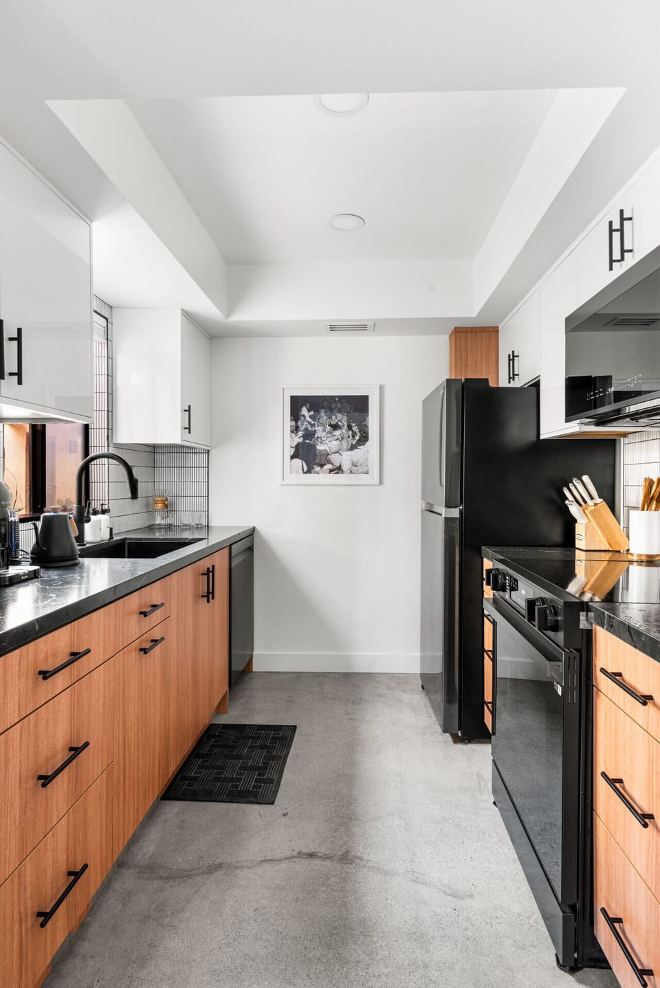 A sleek and fully equipped kitchen with modern appliances ready for home-cooked meals.