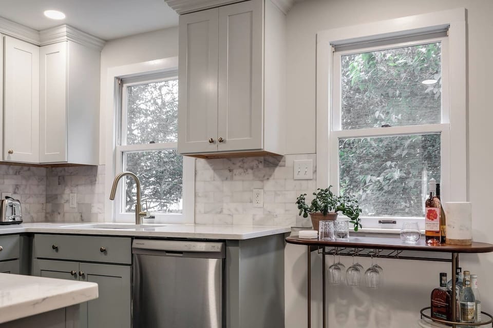 Kitchen: Cook and relax in this stylish, sunlit retreat with modern finishes and thoughtful touches!