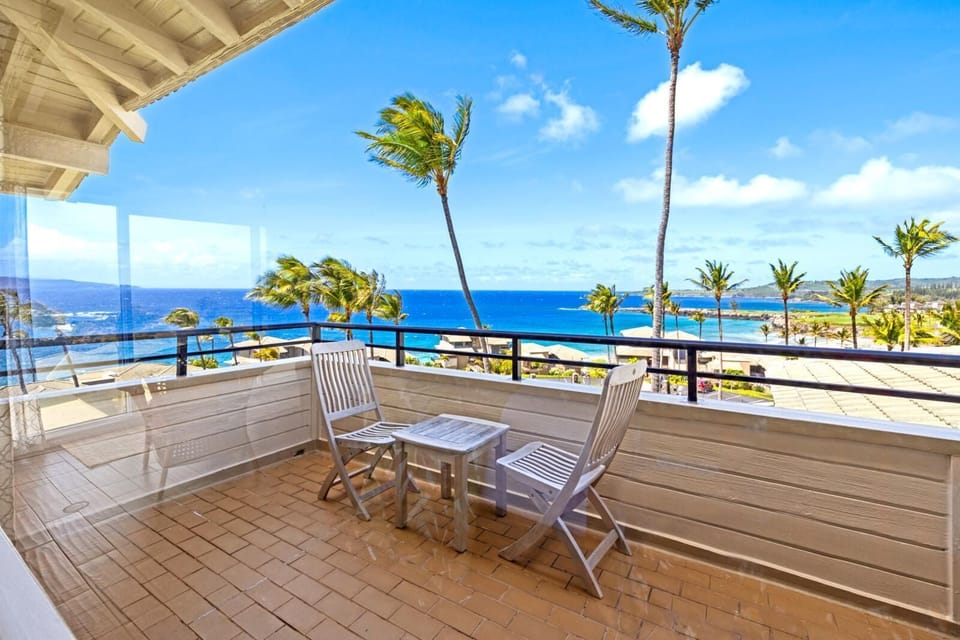 Sip, relax, and soak up the sea breeze—your private perch above palm-lined shores awaits      KBV-15B3