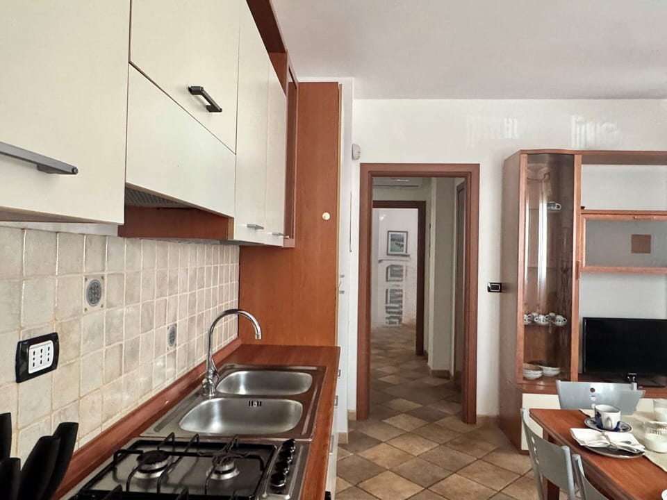 Countertop, Kitchen, Flooring, Major Appliance, Wood, Kitchen Appliance, Interior Design, Floor, Cabinetry, Kitchen Sink