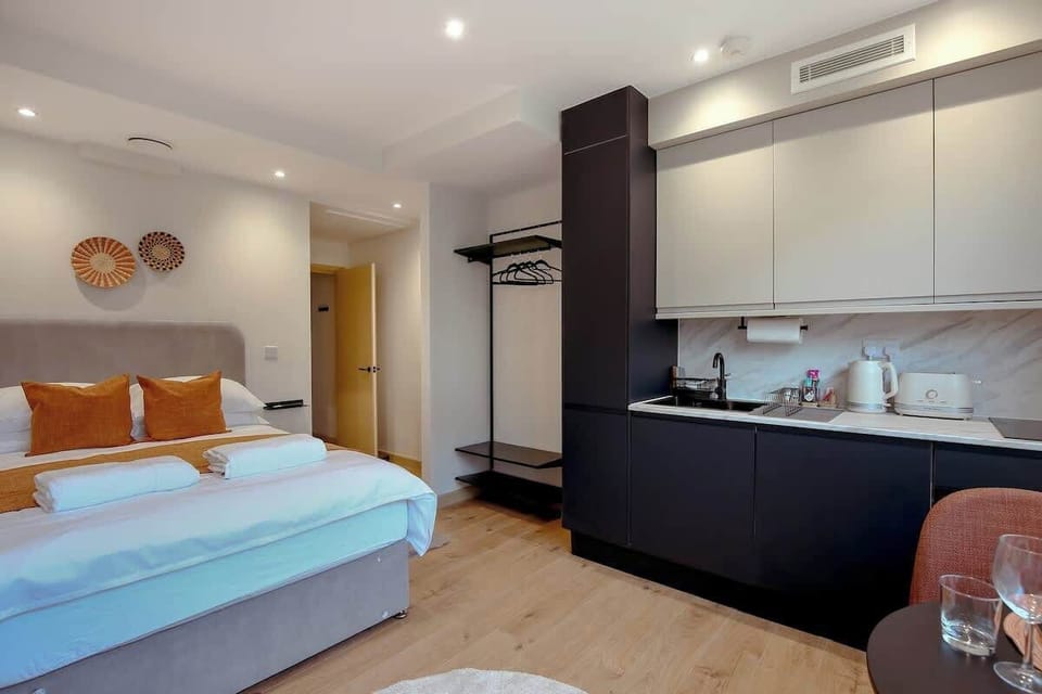 Comfortable bed and kitchen area
