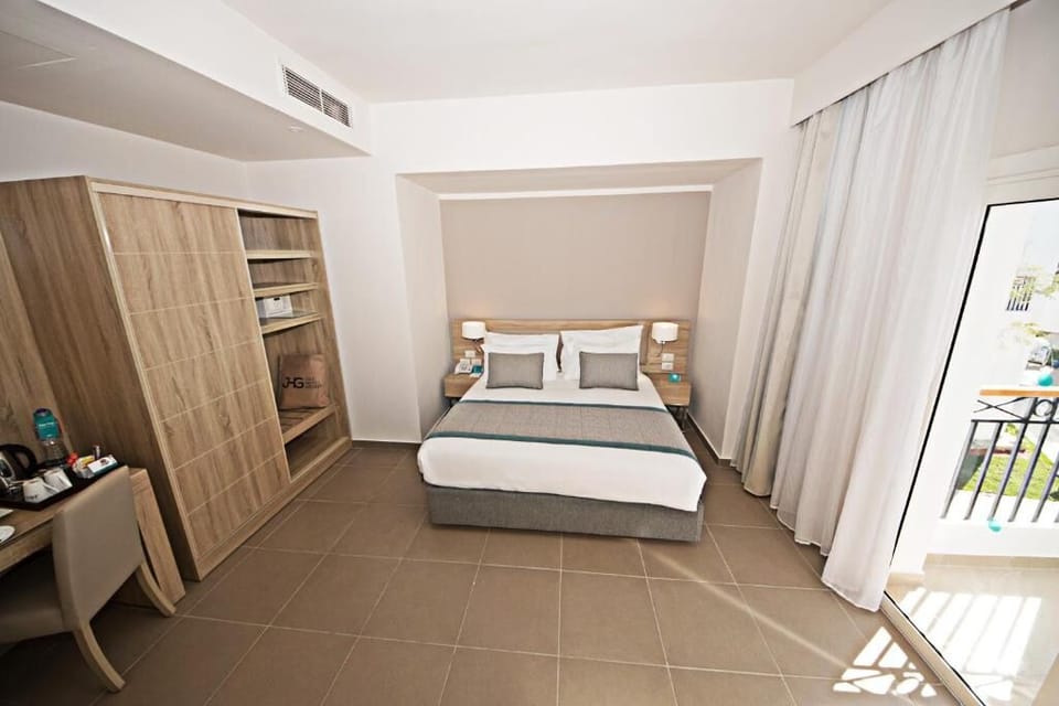 Settle in with extra space, storage, and airy balcony doors.
