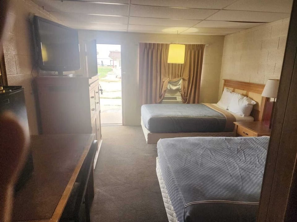 Unwind after adventures in a simple, cozy double-bed room.