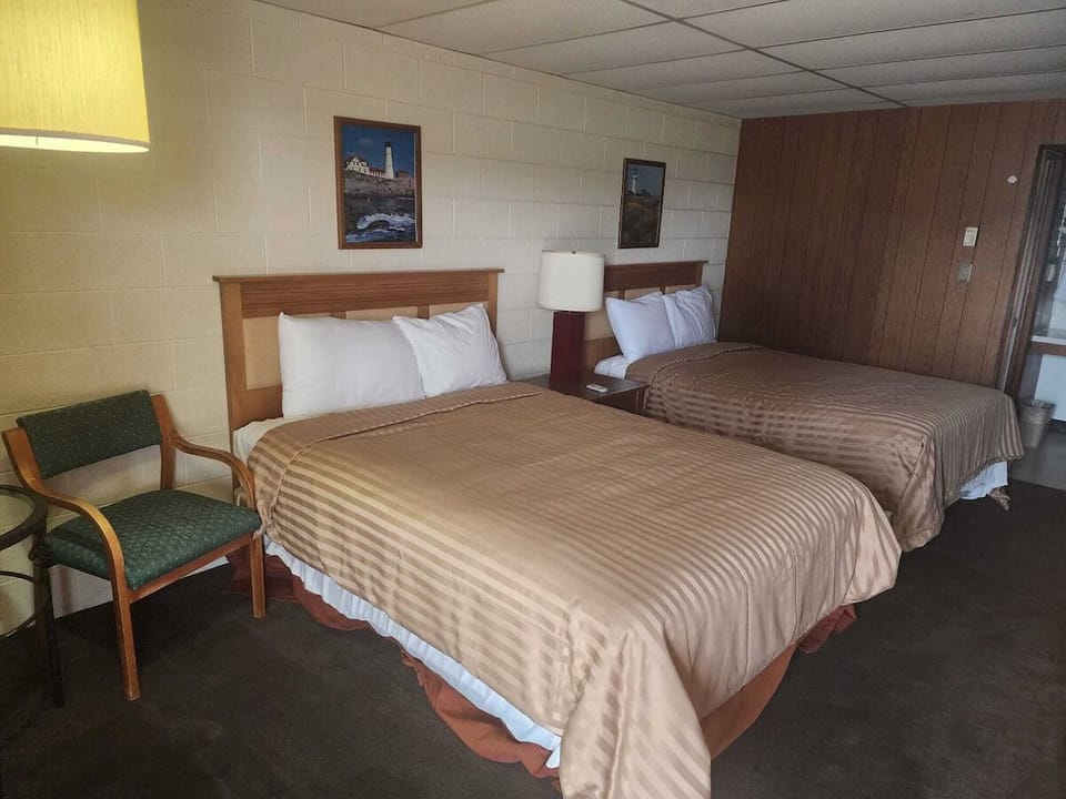 Settle in comfortably with two inviting beds and soft lighting.
