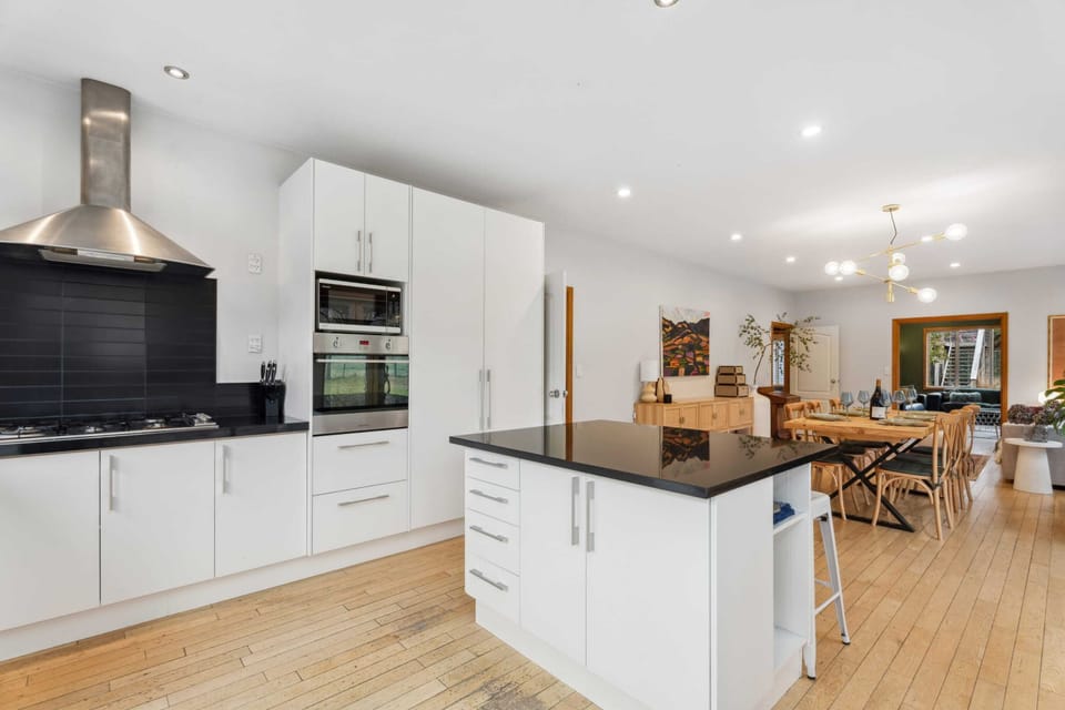 Contemporary kitchen with gas cooktop and oven