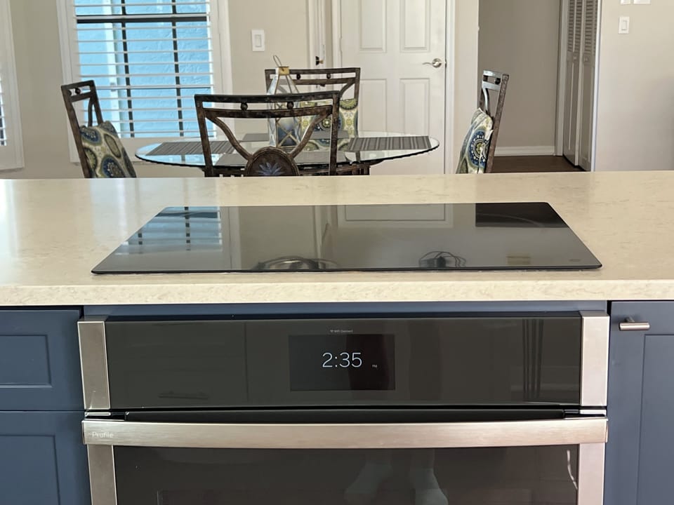 Private kitchen with induction stove and convection/conventional stove
