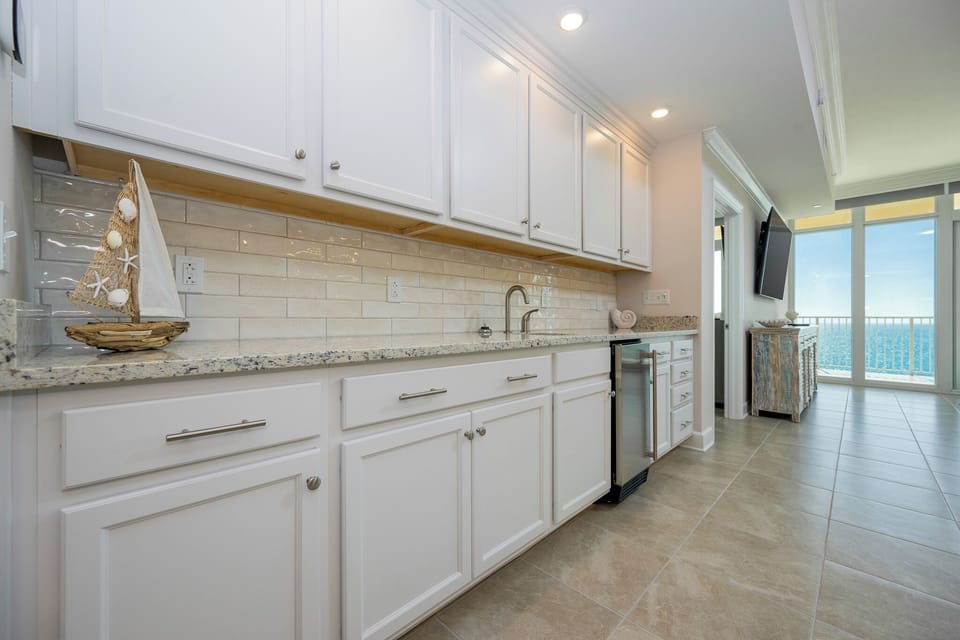 Grab a chilled drink from the fridge or create your favorite cocktail at the wet bar