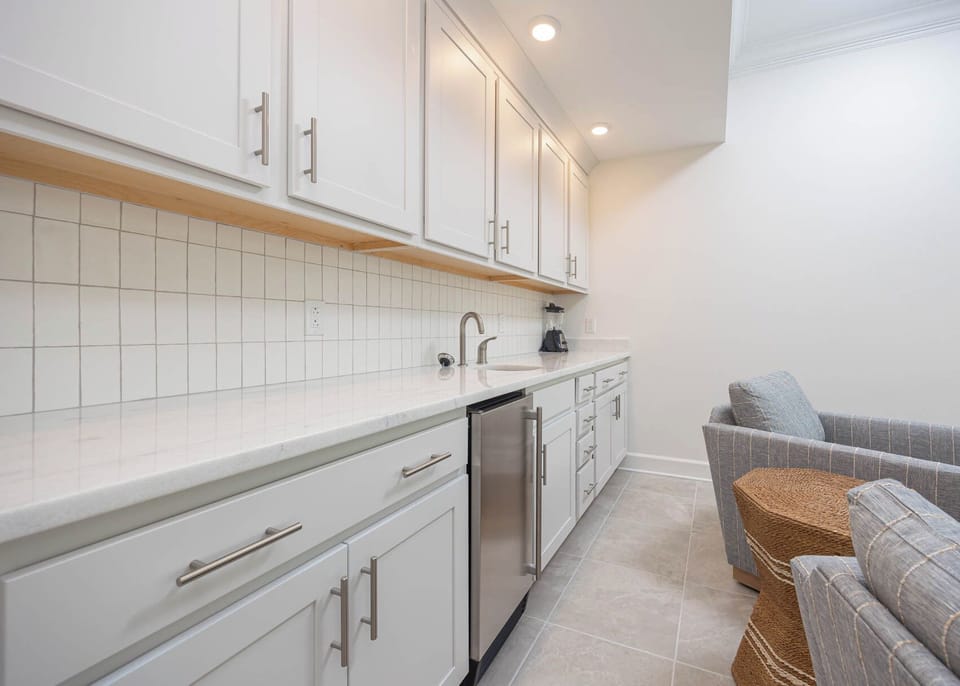 Grab a chilled drink from the fridge or create your favorite cocktail at the wet bar