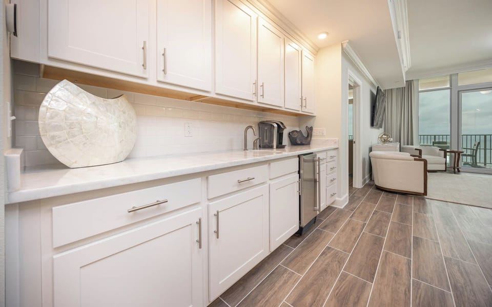 Grab a chilled drink from the fridge or create your favorite cocktail at the wet bar