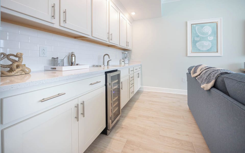 Grab a chilled bottle from the wine cooler or create your favorite cocktail at the wet bar