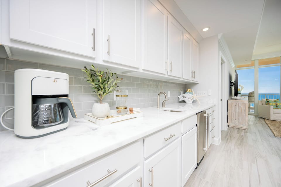 Grab a chilled drink from the fridge, brew your morning coffee, or create your favorite cocktail at the wet bar