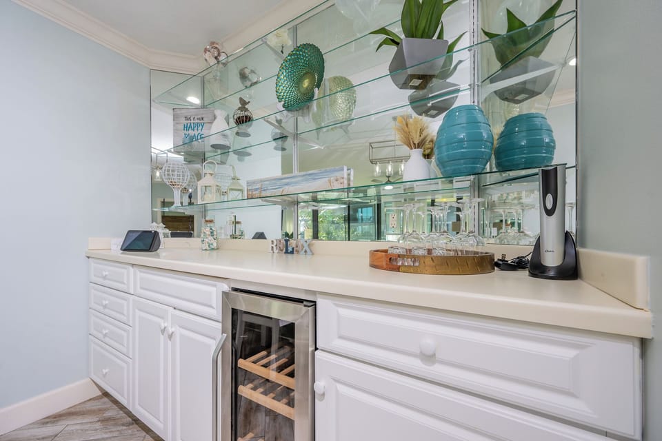 Grab a chilled bottle from the wine cooler or create your favorite cocktail at the wet bar