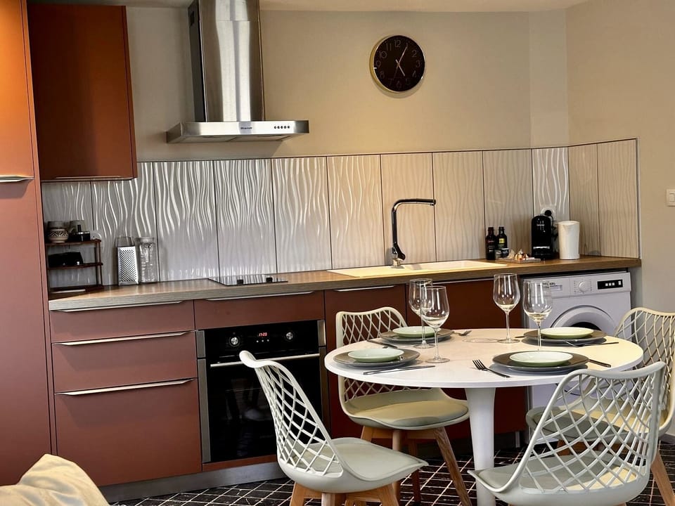 Bright kitchen with countertop and storage space.