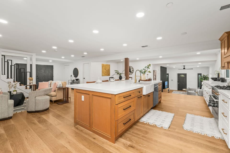 Open-concept kitchen with island and stainless steel appliances