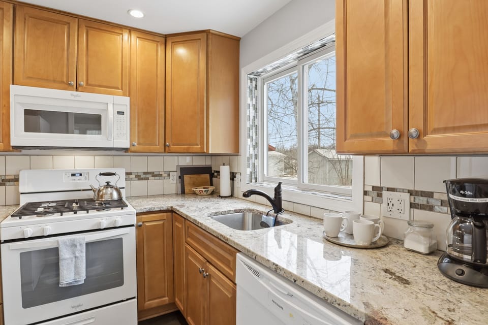 Everything you need for efficient meal preparation in this lovely kitchen!