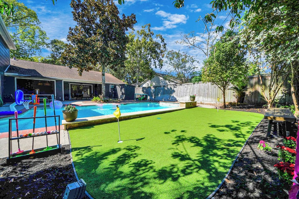 This home features great INDOOR/OUTDOOR Entertaining space - practice your putting, play some pool basketball, BBQ, play some billiards, arcade games, board games or whatever your heart desires! 