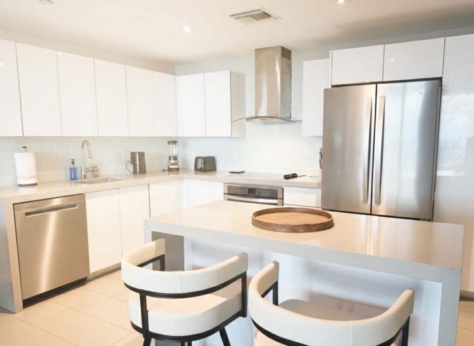 Kitchen Island: The perfect spot to enjoy breakfast or gather around while hosting friends.