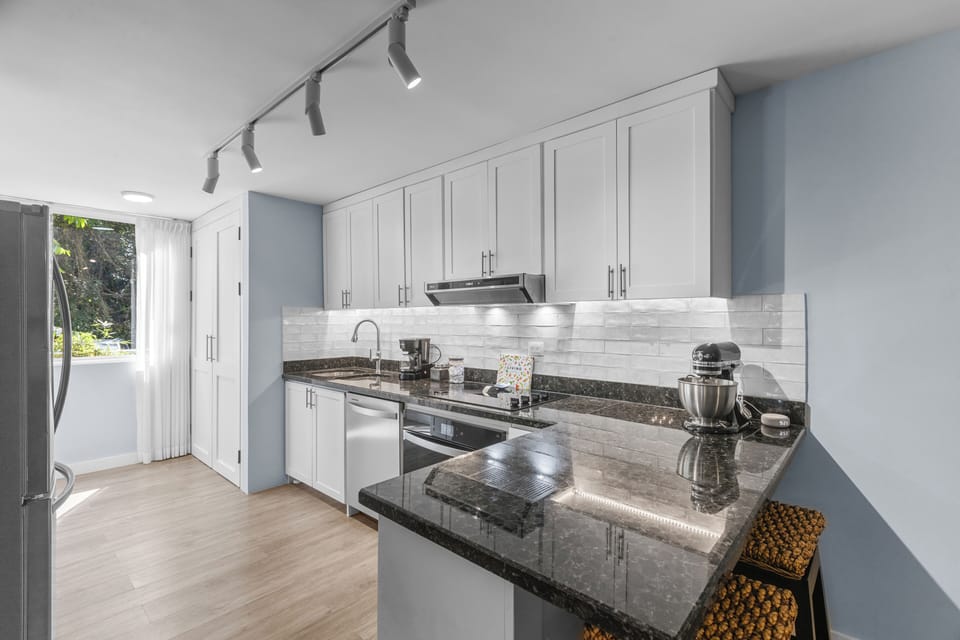 A chef's dream kitchen with all new appliances and granite countertops.