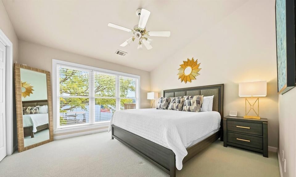 Bedroom 4 (King): Vaulted ceilings and sunlight galore make this room feel like a retreat.