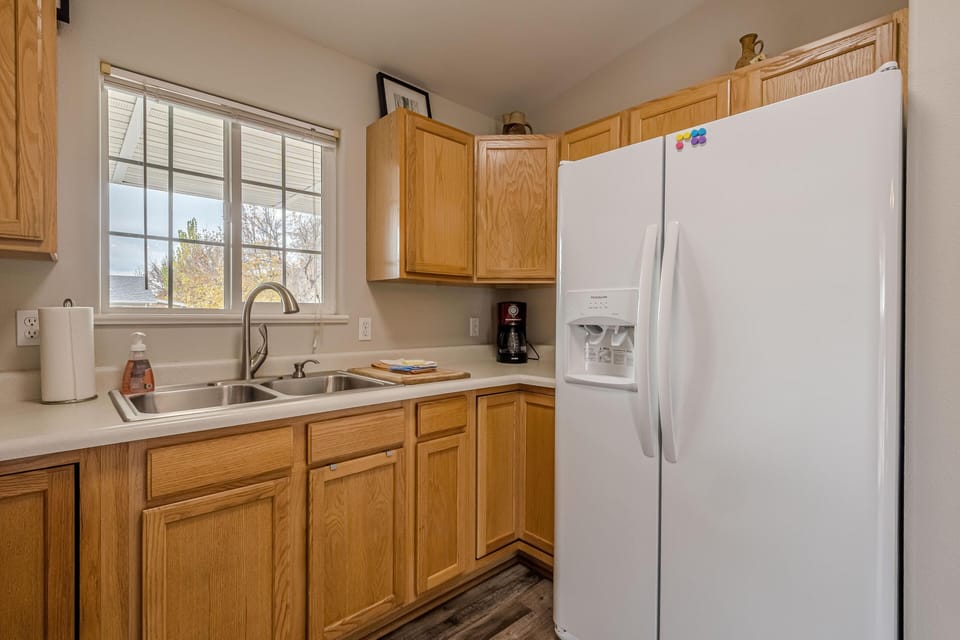 Bright kitchen with ample storage and natural light